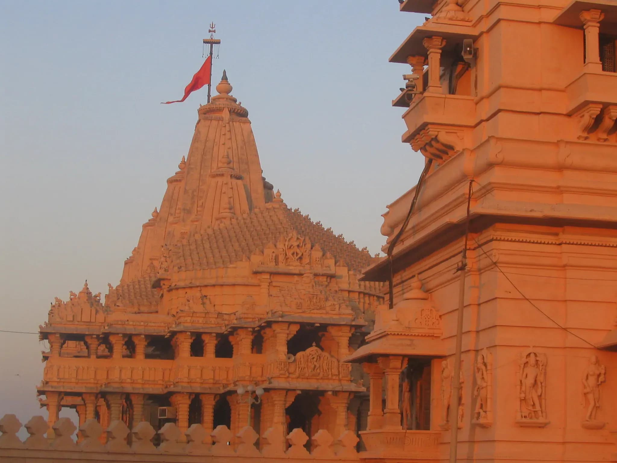 The salty air, thick with the scent of the Arabian Sea, whipped around me as I stood before the Somnath Temple, its majestic shikhara piercing the cerulean sky. Having grown up amidst the ancient tem...