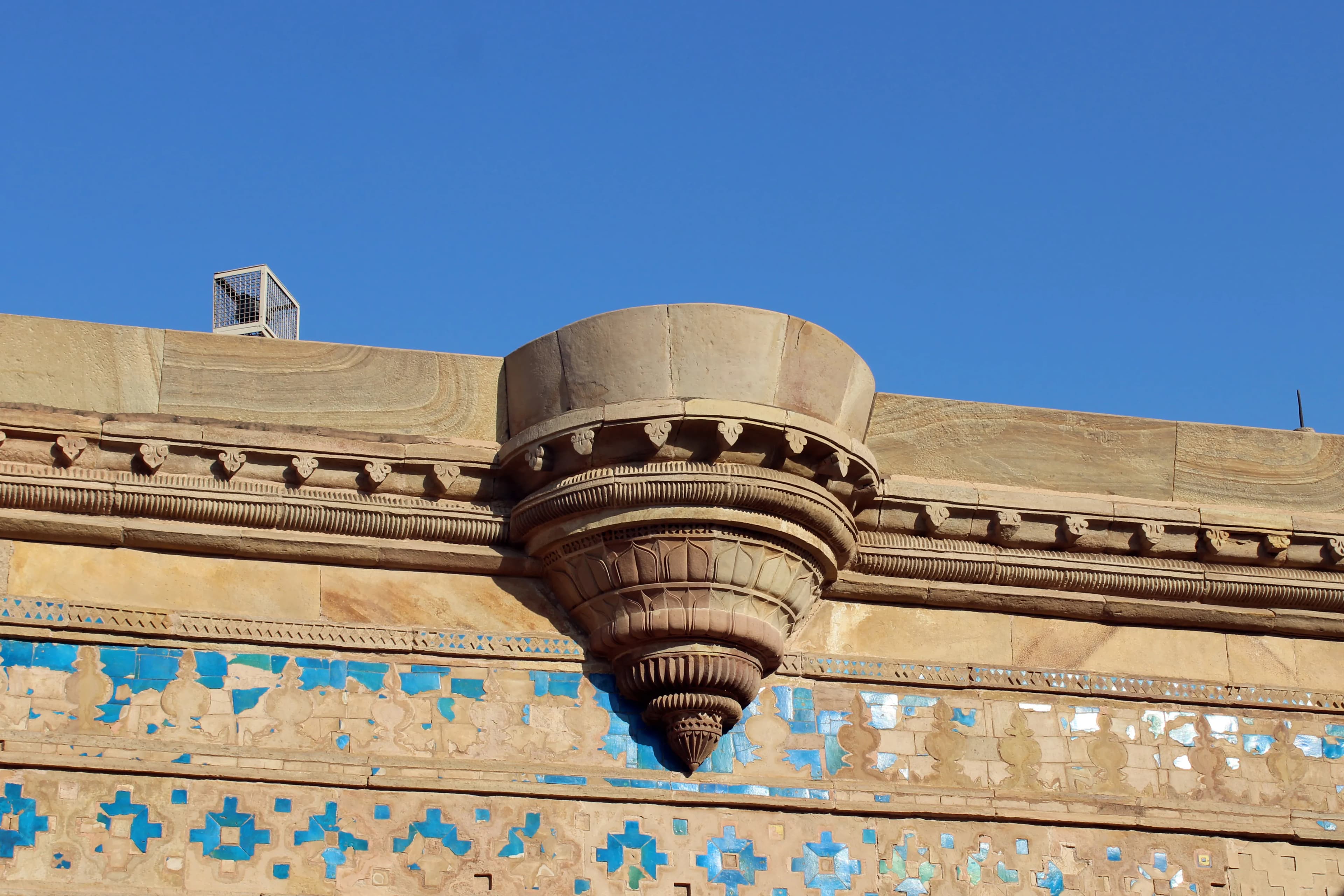 The sun, a molten orb in the Gwalior sky, cast long shadows across the sandstone ramparts of the fort, painting the scene in hues of ochre and gold. My ascent, via the winding, fortified road, felt l...