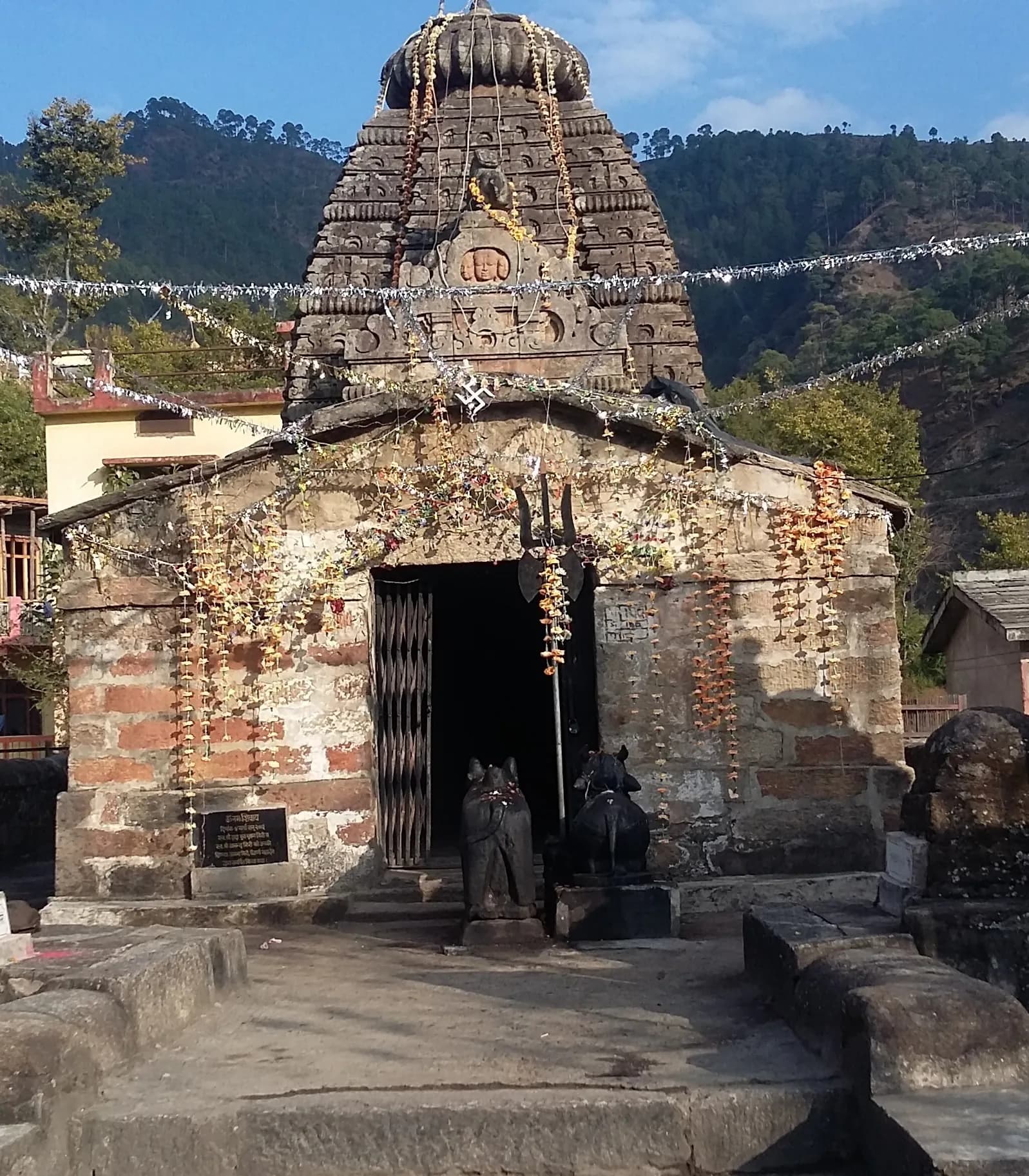 The humidity hung heavy, a stark contrast to the dry air of my Rajasthani homeland. Here, amidst the verdant hills of Dimapur, Nagaland, stood the Shiv Temple, a structure that whispered tales of a b...