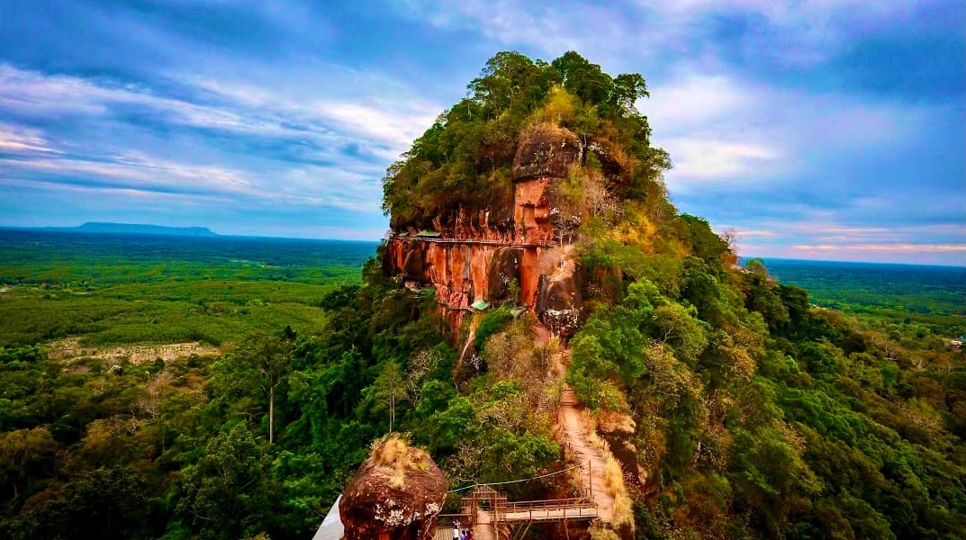 Wat Phu Tok Khmer Sanctuary, also known as Prasat Hin Phu Khao Thong, located in Kanthararom District of Si Sa Ket Province, represents an important 11th-century Khmer sandstone temple that served as ...
