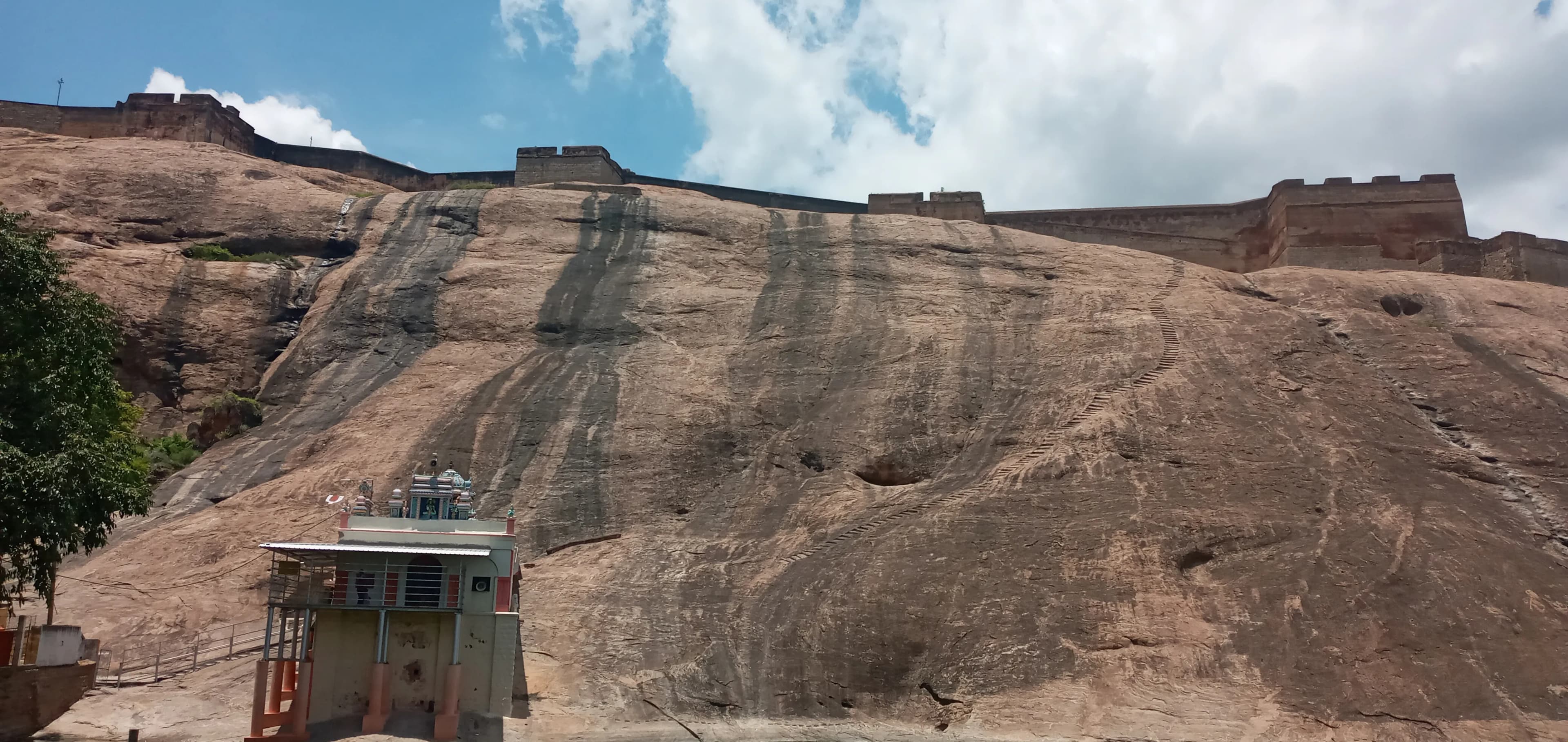 The imposing silhouette of Dindigul Fort, perched atop a rocky hill, dominated the landscape long before I even reached the town. Having explored the basalt-carved wonders of Maharashtra, I was eager...